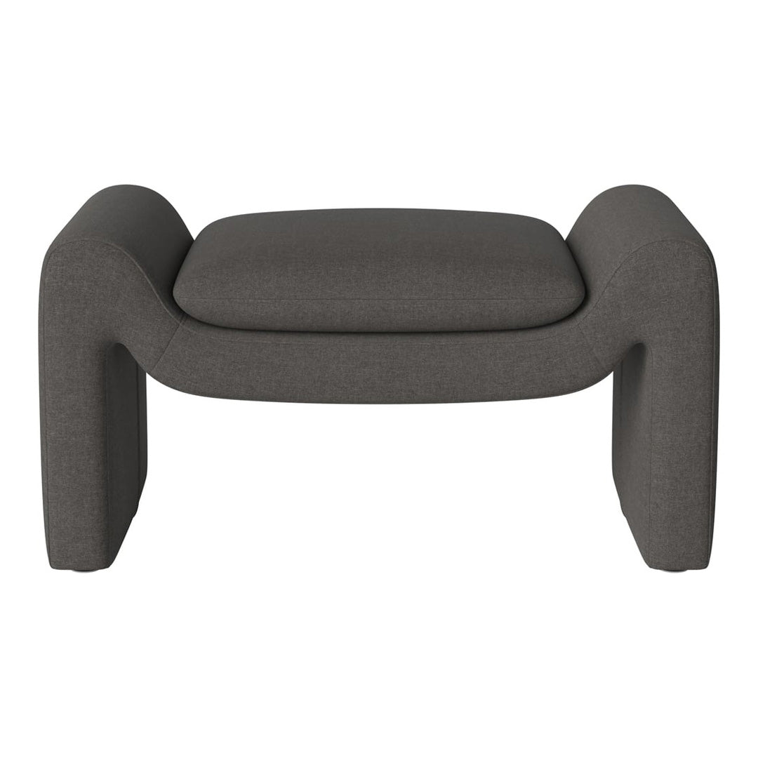Gray upholstered ottoman featuring a minimalist design and smooth texture, ideal for modern decor.