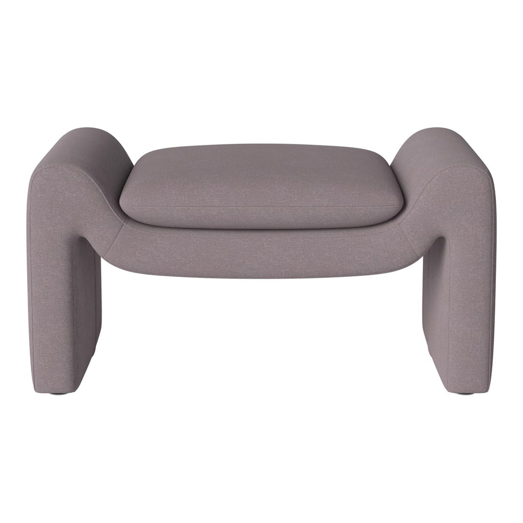 Light gray modern ottoman with a smooth fabric texture and curved edges, perfect for contemporary decor.