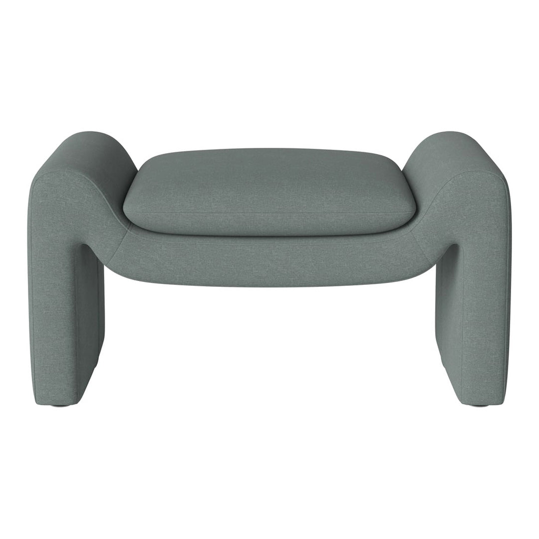 Contemporary gray upholstered ottoman with smooth, minimalist design and soft texture. Perfect for modern decor.