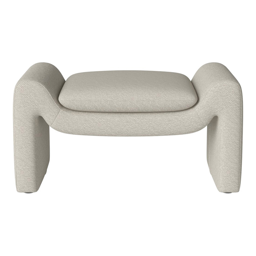 Light beige upholstered ottoman with a textured pattern and rounded edges for a modern touch.