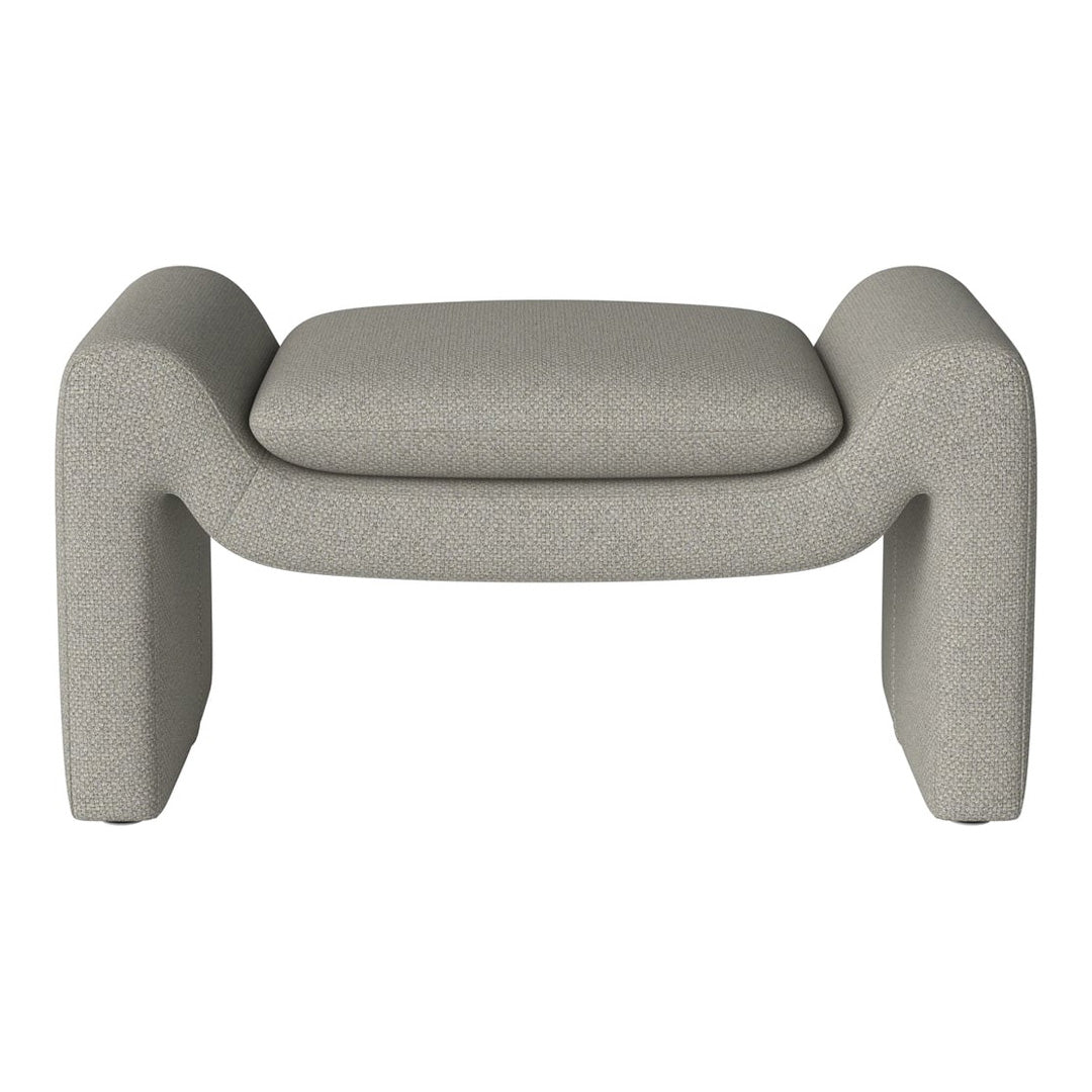 Light gray ottoman with a textured pattern, featuring soft rounded edges and a minimalist design. Perfect for modern decor.