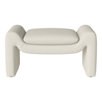 Cream-colored ottoman with a textured fabric and modern, sculptural design. Soft, minimalist aesthetic.
