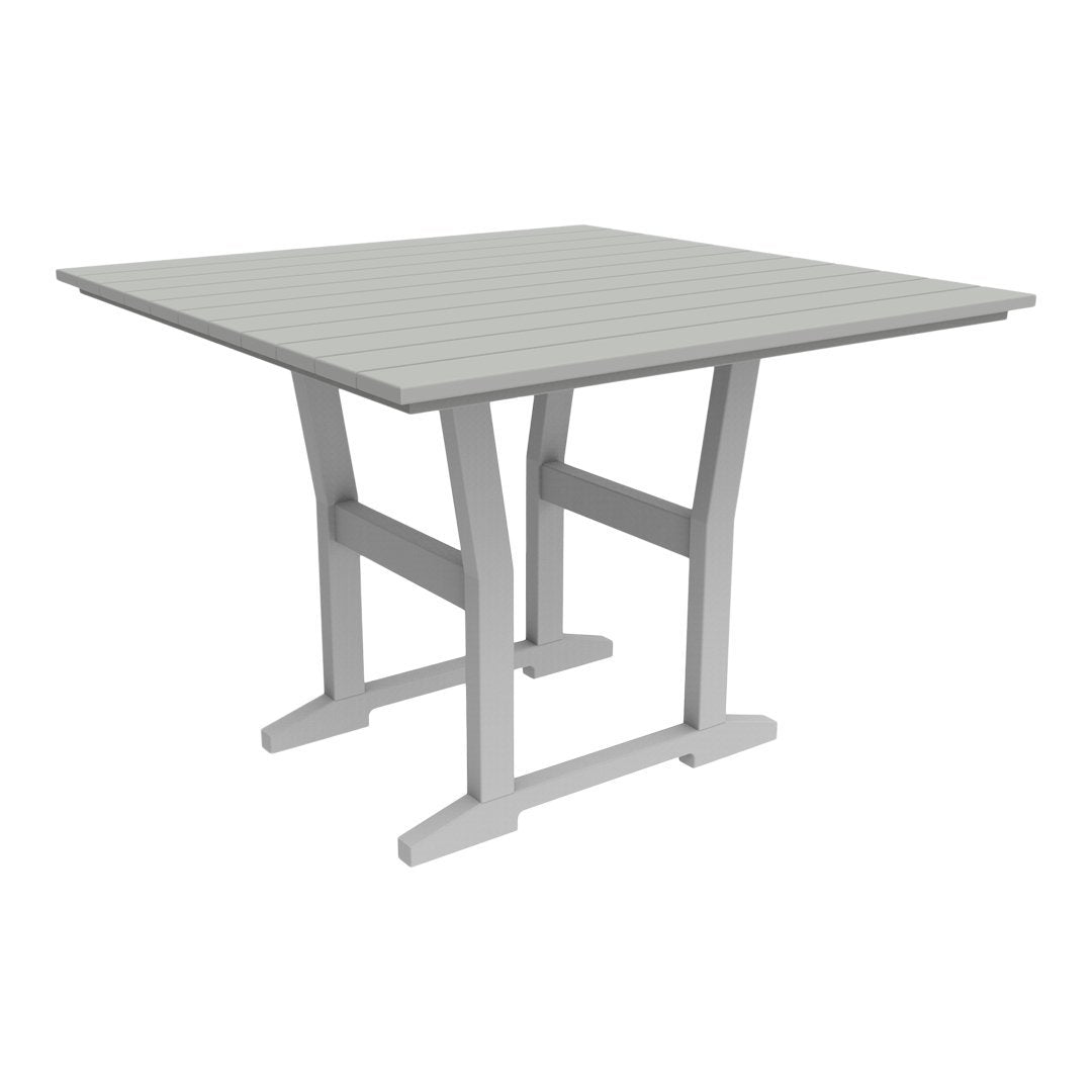 Light gray square outdoor table with slatted top and sturdy legs, perfect for patio or garden use.