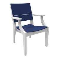 White wooden chair with a solid navy blue cushion, featuring sleek lines and a minimalist design.