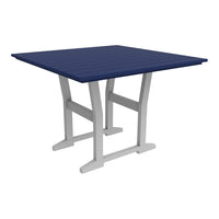 Navy blue slatted tabletop with a contrasting white base, perfect for outdoor dining.