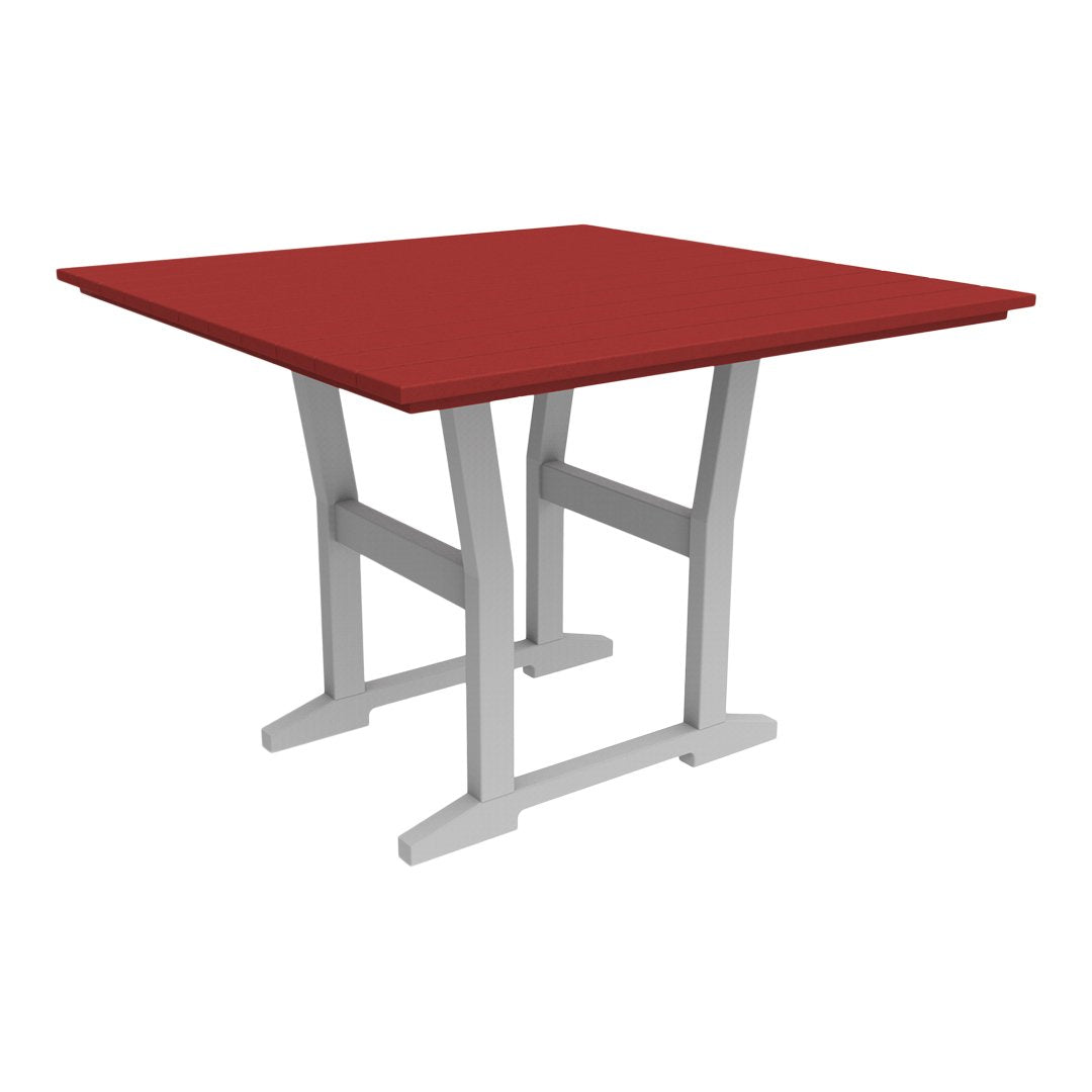 Red square table with a smooth surface and modern gray legs, perfect for dining or casual settings.