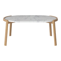 Oval coffee table with white marble top and natural wood legs, featuring sleek, modern lines and a minimalist design.