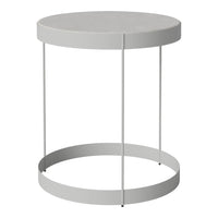 Round gray side table with a sleek, minimalist design and smooth finish. Ideal for modern decor.