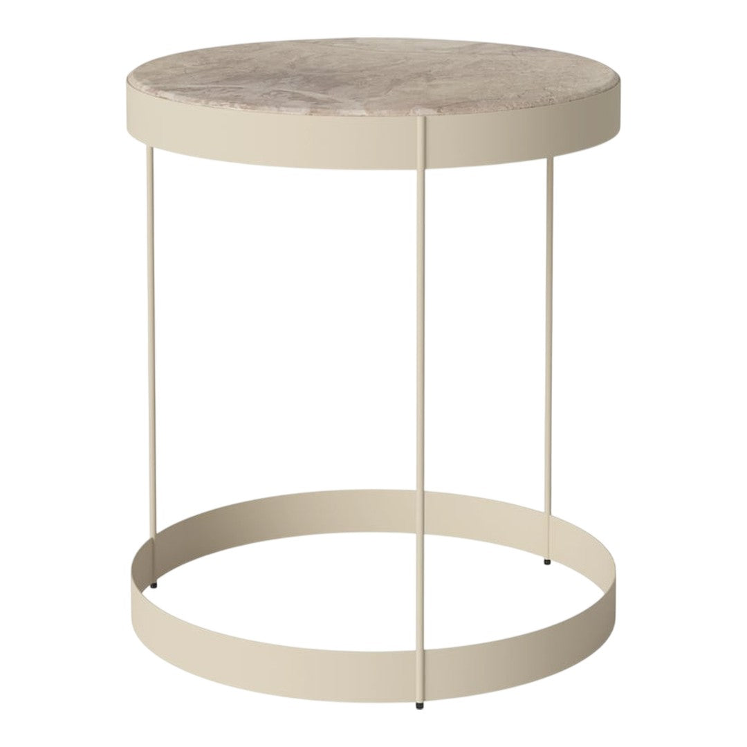 Beige metal side table with a circular top featuring a textured light gray surface. Simple and modern design.