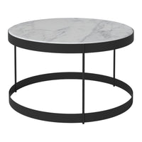 Round coffee table with a white marble top and a sleek black metal base. Modern, minimalist design.
