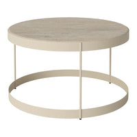 Round coffee table with a light beige top and cream metal frame, featuring a smooth, minimalist design.