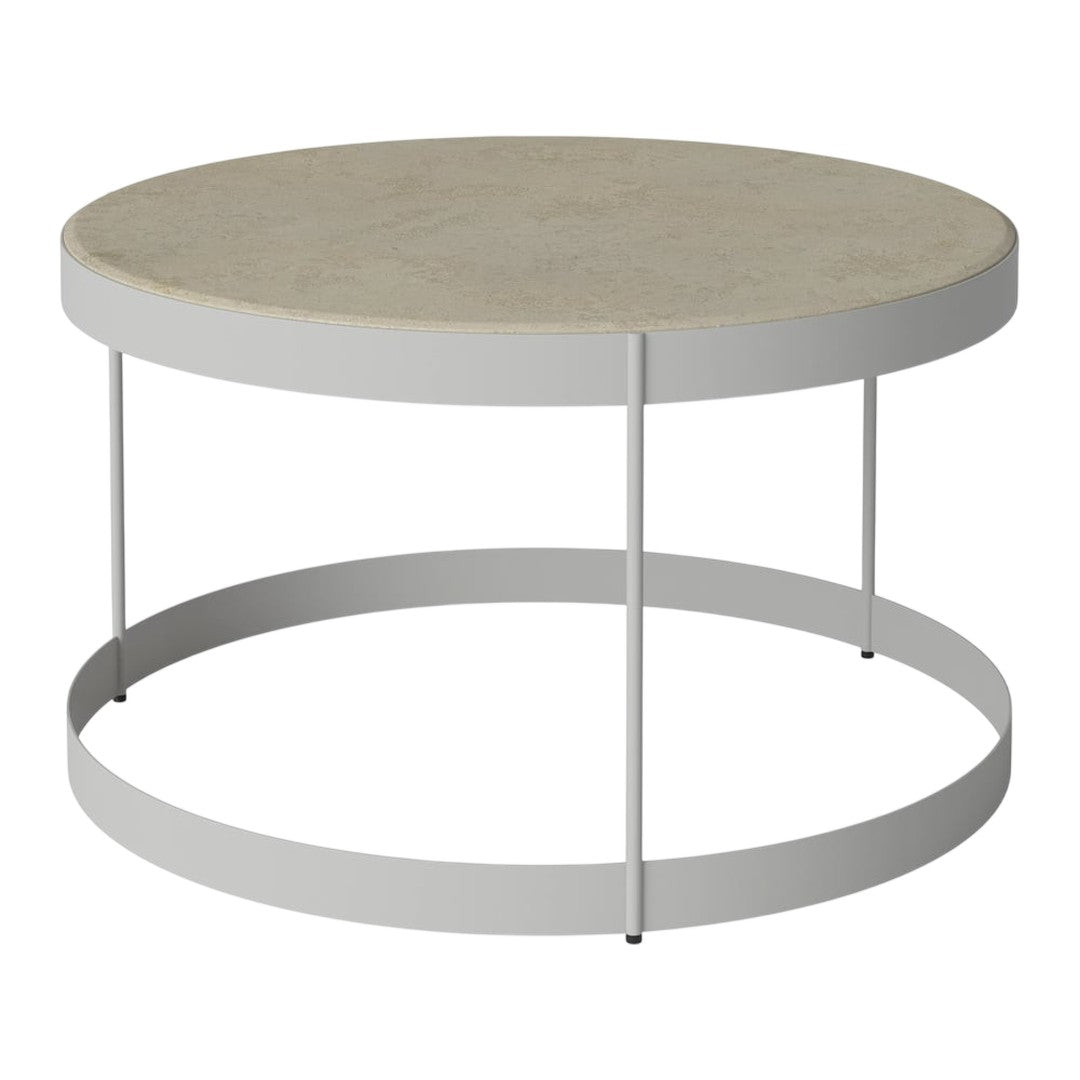 Round coffee table with a light beige stone top and sleek white metal frame, featuring a minimalist modern design.