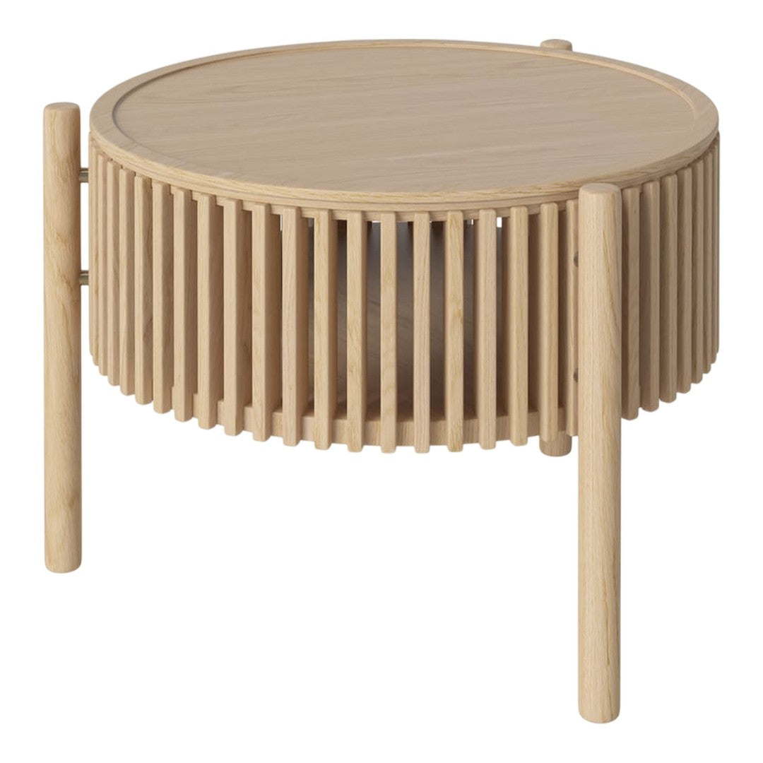Natural wood round coffee table with vertical slats and a smooth circular top in light beige tones.