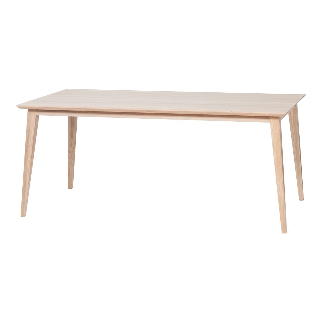 Light wooden dining table with a smooth, natural finish and tapered legs, showcasing a minimalist design.