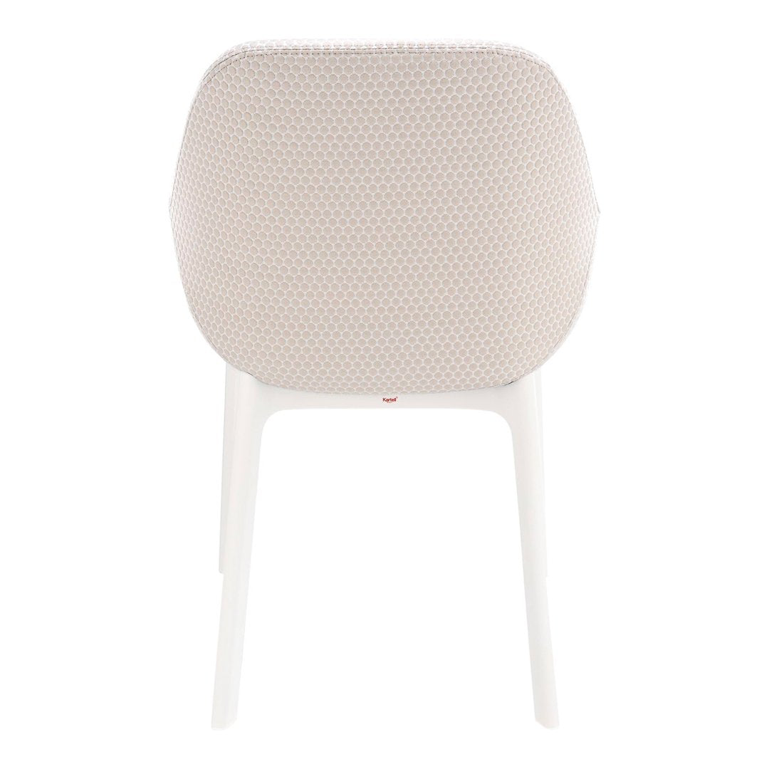 Beige textured chair with a white frame, featuring a subtle honeycomb pattern. Perfect for modern decor.