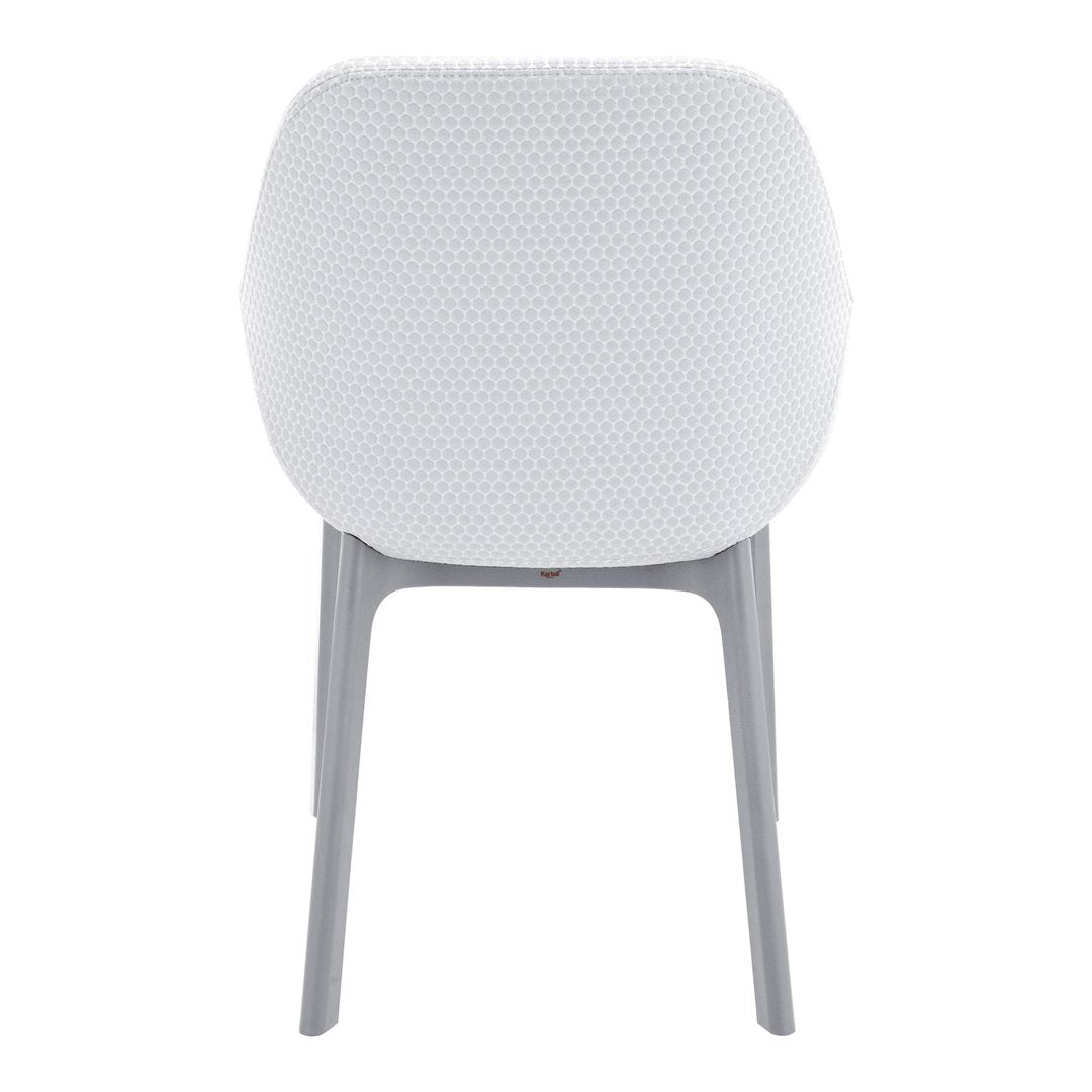 White textured chair back with subtle patterns and gray legs, offering a modern aesthetic for any space.