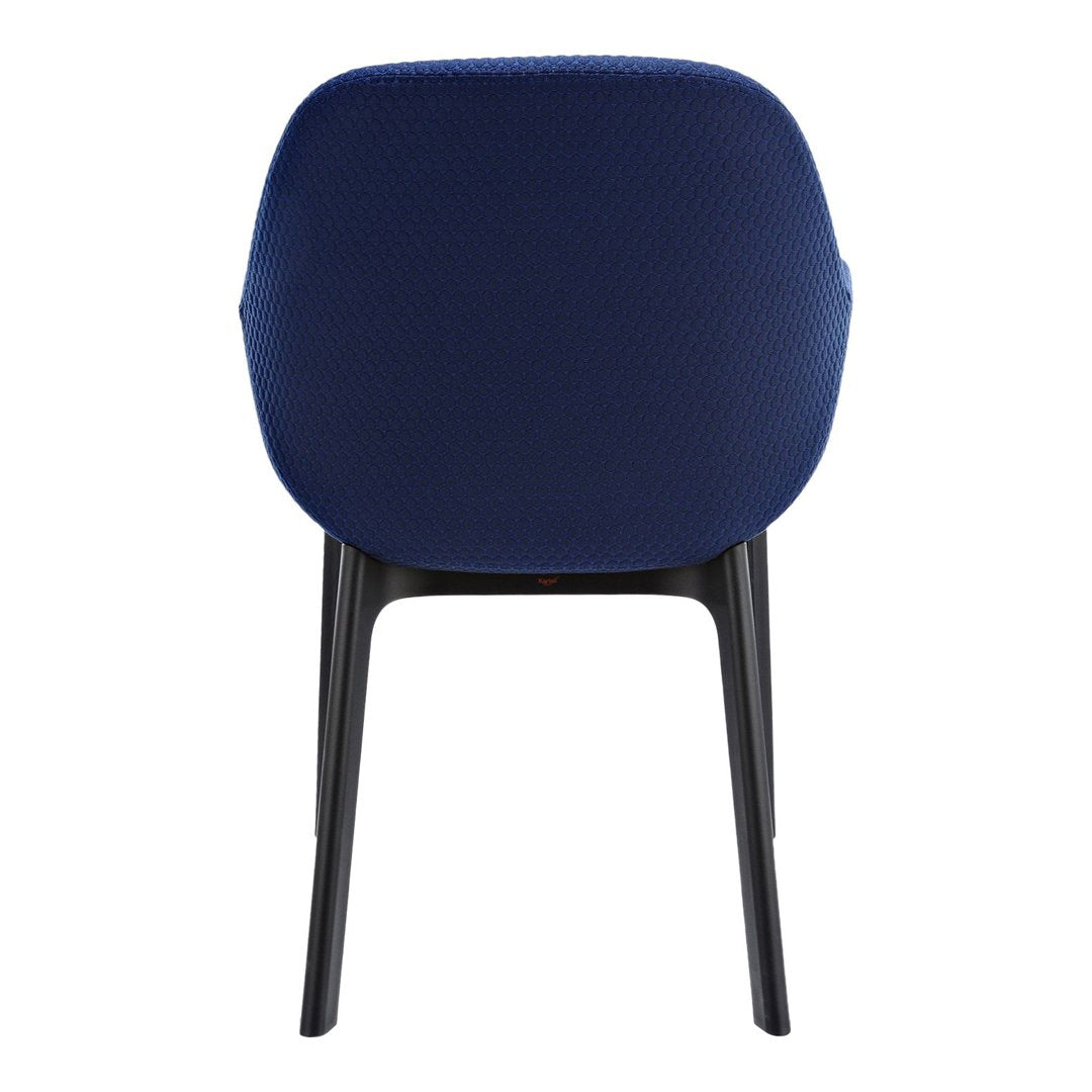 Navy blue fabric chair with a smooth finish and sleek black legs, showcasing a minimalist design.