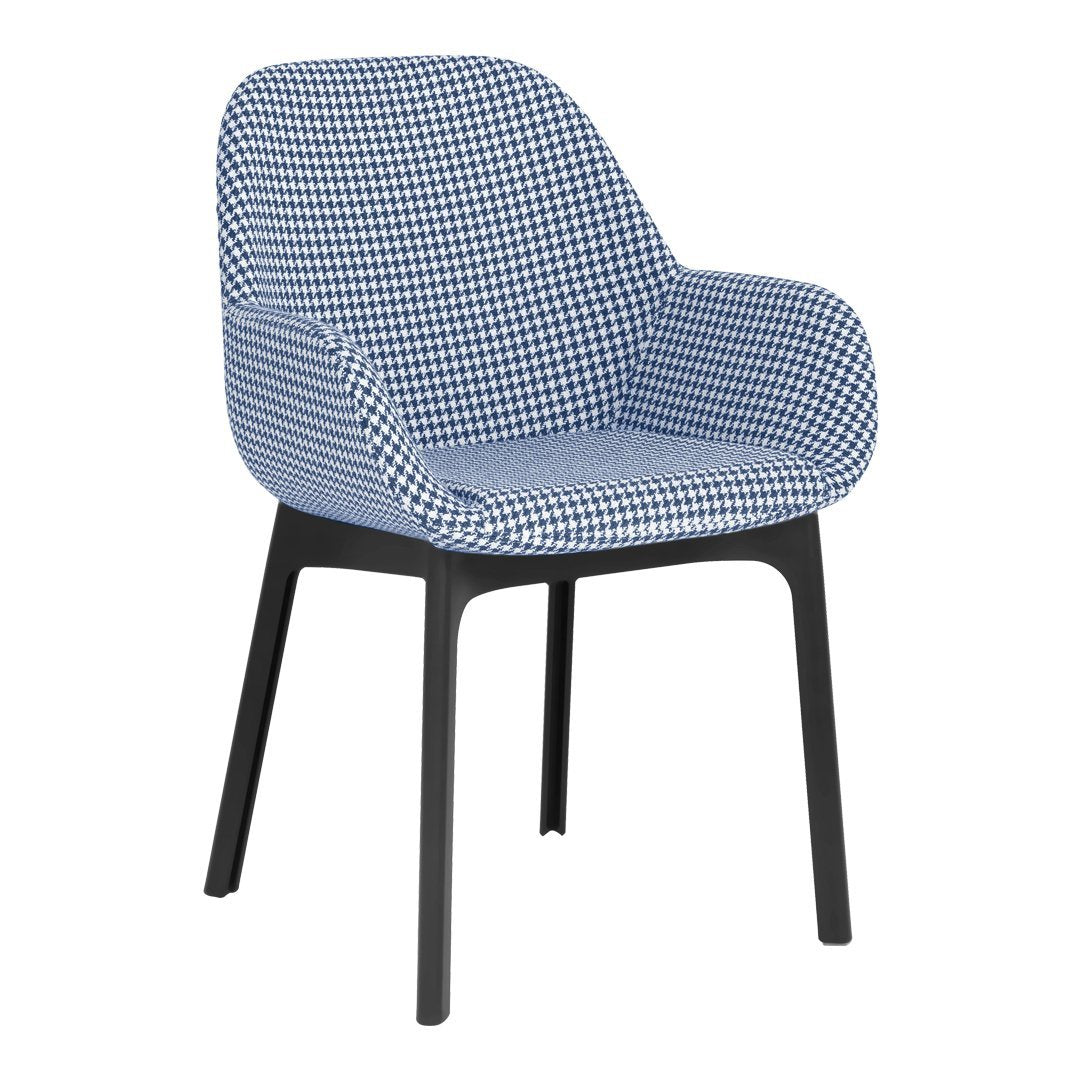 Blue and white checkered pattern armchair with sleek black legs. Perfect blend of modern style and comfort.