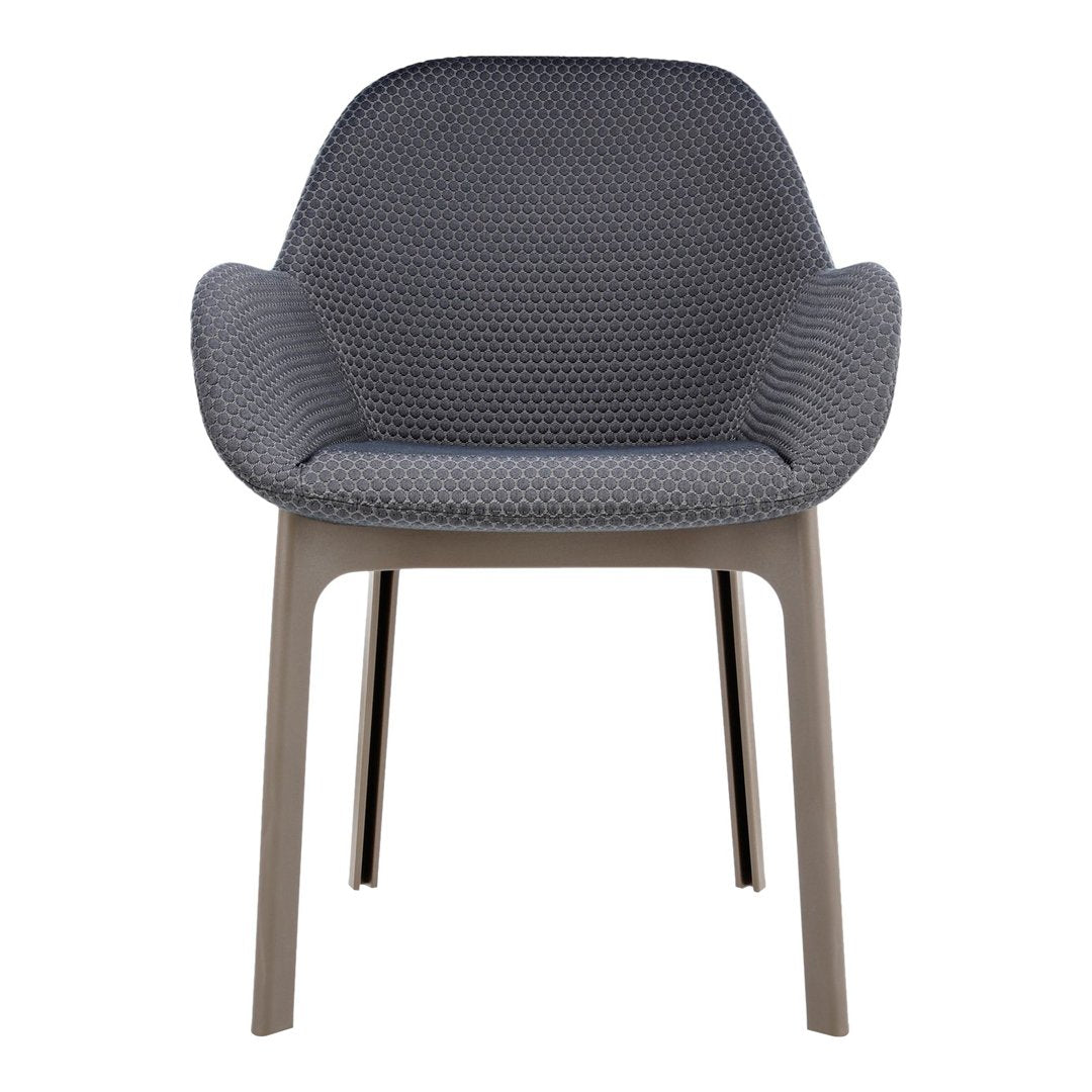 Gray patterned chair with a sleek design and light gray legs, perfect for modern interiors.