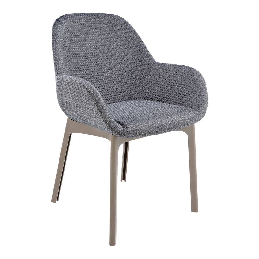 Gray upholstered chair with a textured pattern and light beige legs, perfect for modern decor.