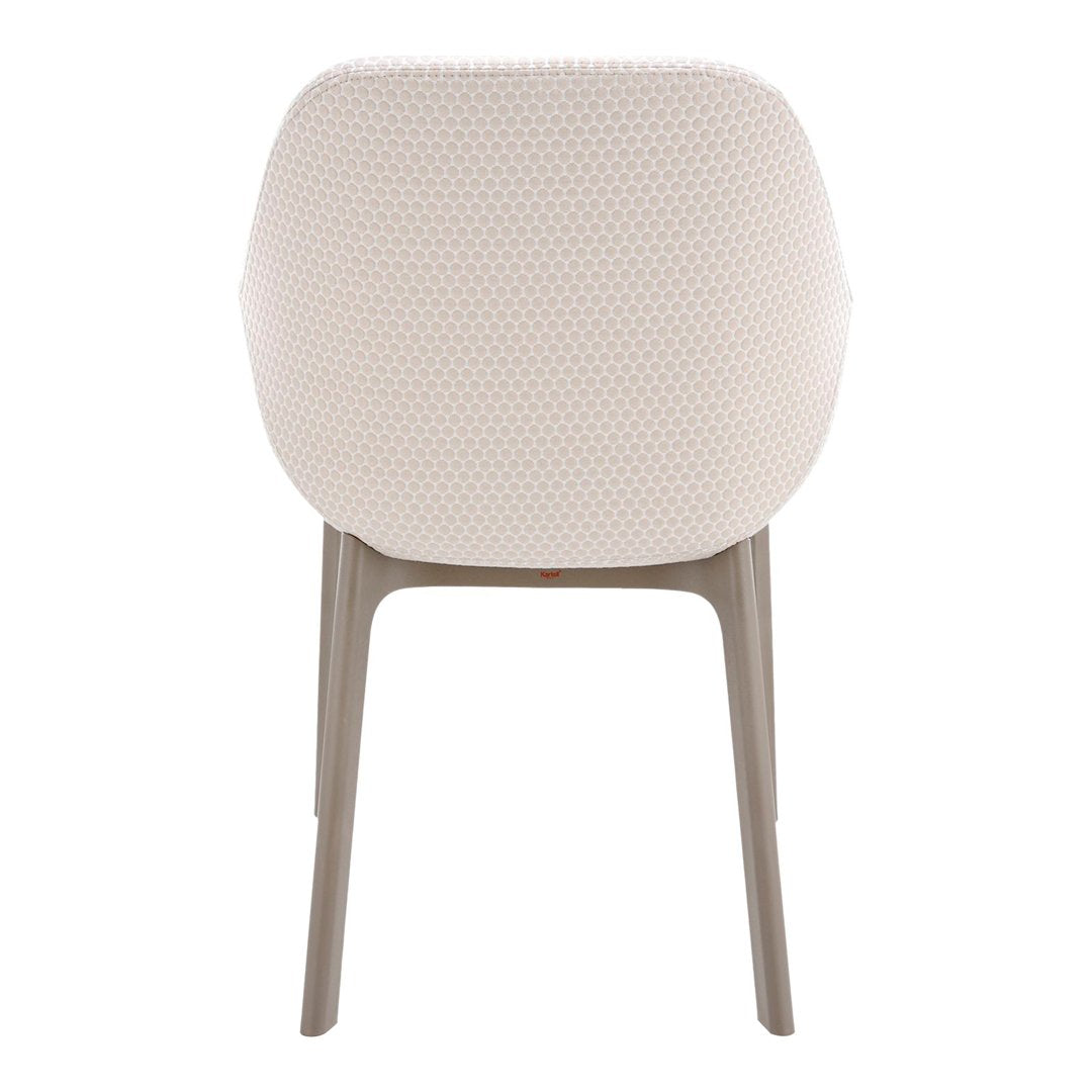 Cream textured fabric chair with light gray legs, featuring a subtle honeycomb pattern for a modern look.