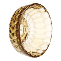 Amber glass bowl with a textured honeycomb pattern and glossy finish, perfect for elegant table settings.