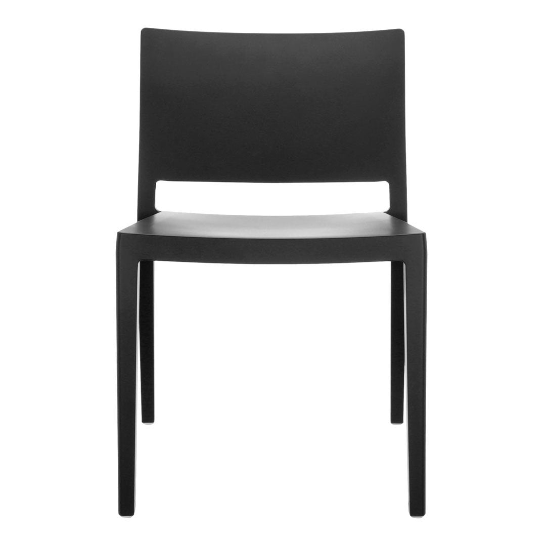 Black minimalist chair with a sleek design and smooth matte finish, featuring a subtle open back.