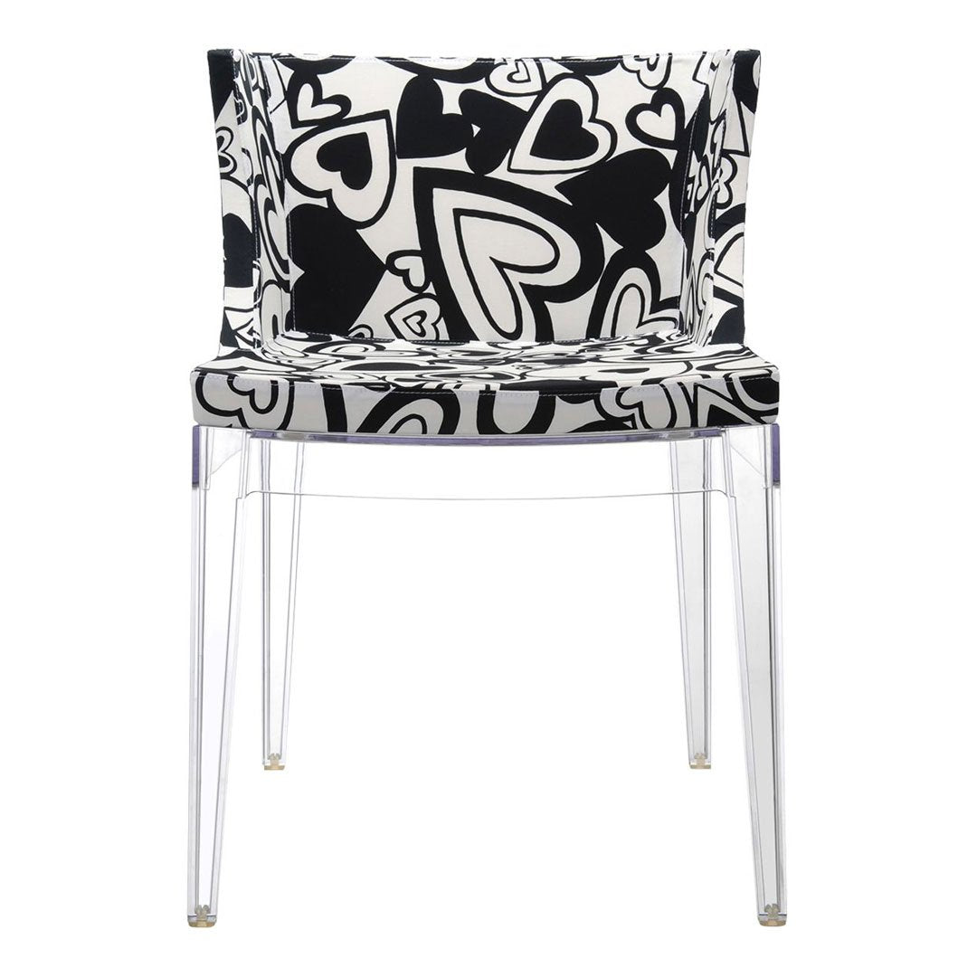 Black and white chair featuring a whimsical hearts pattern on a transparent design. Perfect for modern decor.