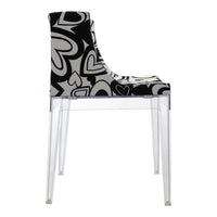 Black and white chair with a heart pattern, featuring a clear acrylic base. Stylish and contemporary design.