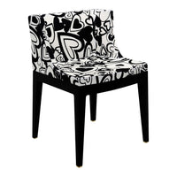 Black and white chair featuring a playful heart pattern on the seat and backrest, with sleek black legs.