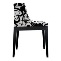 Black and white chair featuring a bold heart pattern on a sleek frame. Perfect for modern decor.