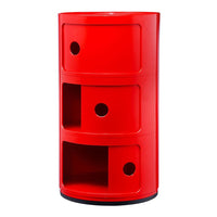 Red storage unit with three compartments and circular cutouts for easy access and ventilation. Modern and stylish design.