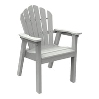 Light gray Adirondack chair with a classic slatted design, perfect for outdoor relaxation.