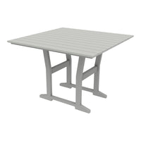 Square gray outdoor table with a slatted top design and sturdy cross legs, perfect for patios or gardens.