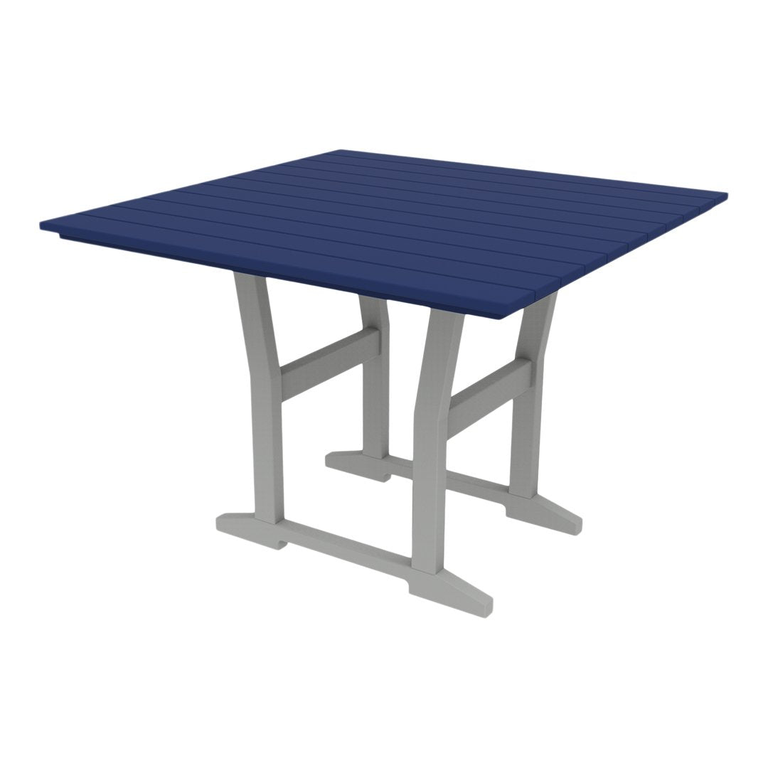 Navy blue slatted tabletop with a gray base for a modern, stylish look. Perfect for outdoor dining.