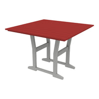 Red square tabletop with a textured finish and a sleek gray metal base. Ideal for modern outdoor settings.