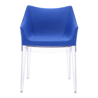 Vibrant blue chair with a sleek design and transparent legs, perfect for modern decor.