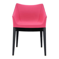 Pink modern chair with sleek, black legs and minimalistic design. Ideal for contemporary decor and vibrant spaces.
