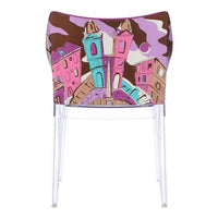 Colorful chair back featuring pink, turquoise, and brown abstract cityscape design with playful patterns.