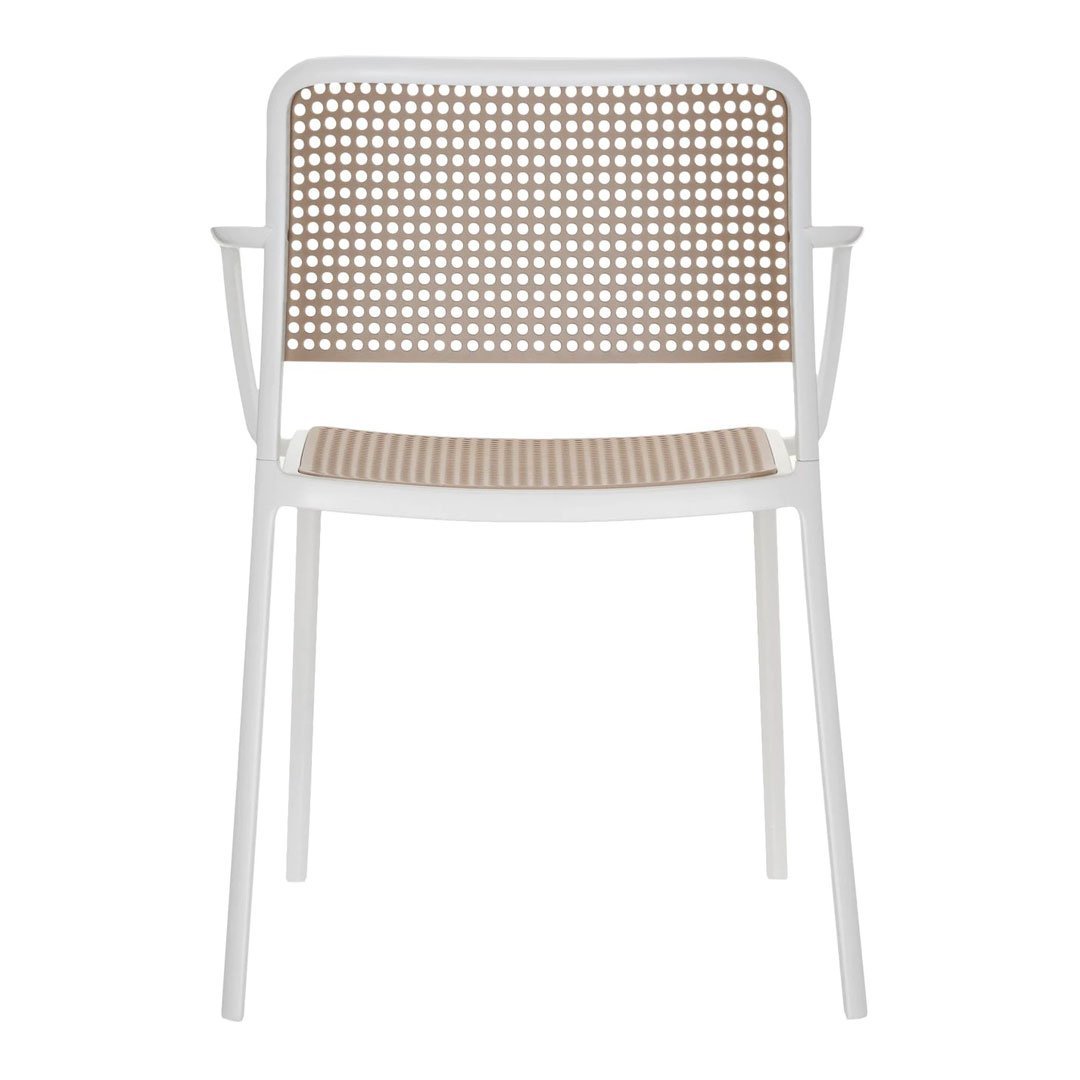 White frame chair with beige woven rattan back and seat, featuring a modern geometric pattern.