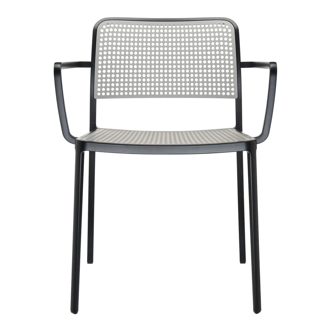 Gray and black patterned chair with a modern design, featuring a perforated backrest and armrests.