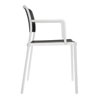 Modern white chair with a black woven seat and backrest, featuring a sleek, minimalist design.