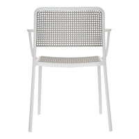 White chair with a perforated backrest and seat pattern, featuring minimalistic design in a sleek, modern style.
