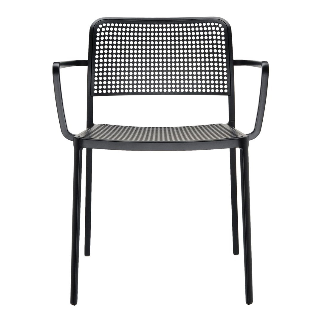 Stylish black chair with a perforated pattern and sleek armrests, perfect for modern decor.