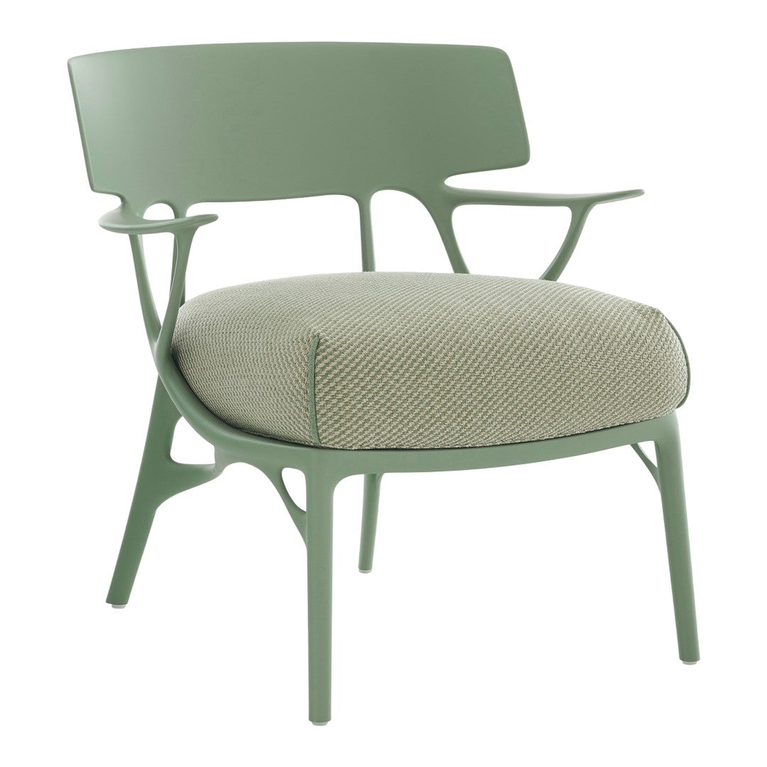Green chair with a textured light green seat cushion, featuring a modern design and smooth, curved lines.