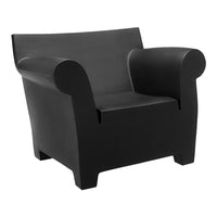 Black minimalist armchair with smooth, solid surface and curved armrests. Perfect for modern decor.