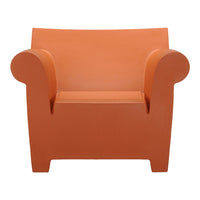 Orange modern armchair with smooth, rounded edges and a minimalist design. Perfect for contemporary decor.