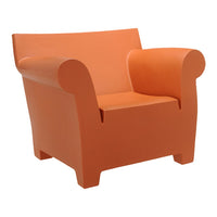 Stylish orange chair with smooth, bold design, perfect for modern decor.