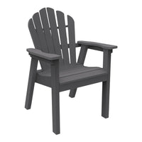 Gray Adirondack chair with a classic slatted design, perfect for outdoor relaxation.