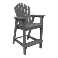 Gray outdoor high chair with classic slatted design, perfect for patio or deck use.